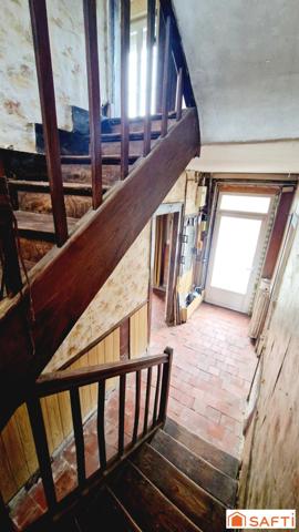 Maison de 117m2 avec jardinet à rénover au centre-ville