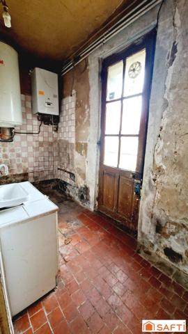 Maison de 117m2 avec jardinet à rénover au centre-ville