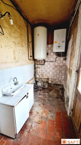 Maison de 117m2 avec jardinet à rénover au centre-ville