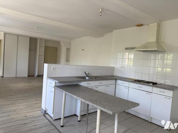 Immeuble composé de trois logements