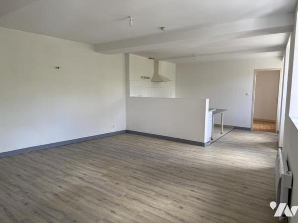 Immeuble composé de trois logements