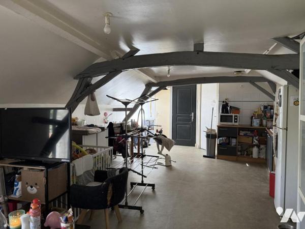 Immeuble composé de trois logements