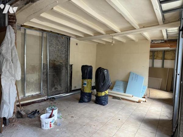 Immeuble composé de trois logements