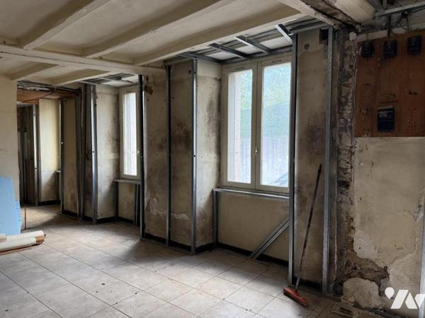 Immeuble composé de trois logements