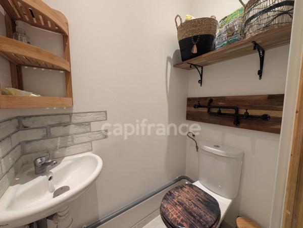 Appartement à vendre 3 pièces, places de parking privatives, cave et jardin