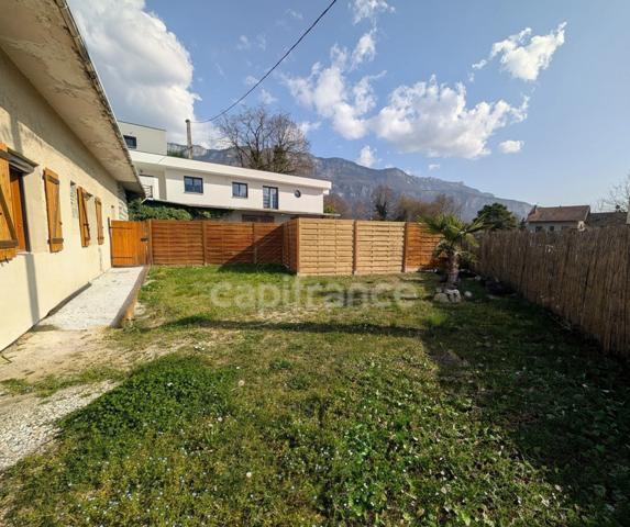 Appartement à vendre 3 pièces, places de parking privatives, cave et jardin