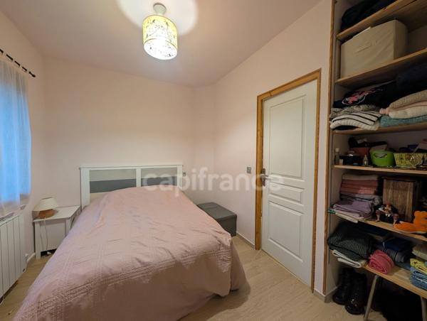 Appartement à vendre 3 pièces, places de parking privatives, cave et jardin