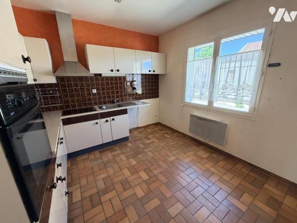 Vente FIXIN maison de plain pied 106 m² habitables 3 chambres sur sous sol et terrain de 978 m²
