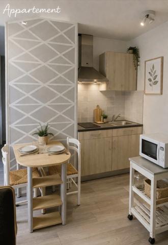 À vendre, ensemble immobilier comprenant une maison d'habitation de caractère et 6 appartements en location.