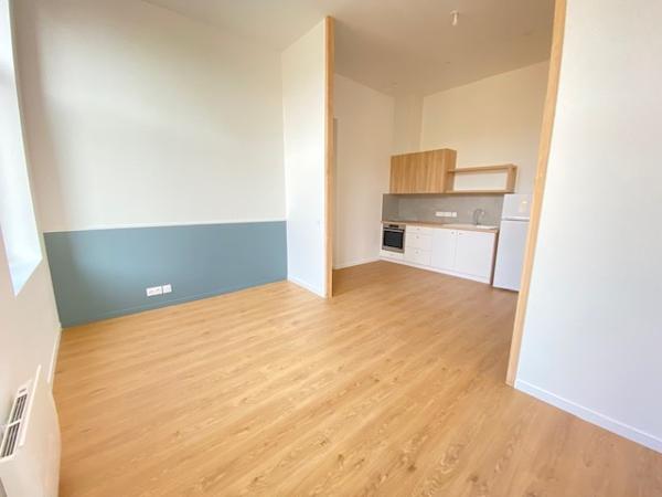 A LOUER  BEL APPARTEMENT CENTRE VILLE DE ST QUENTIN 02100