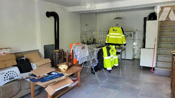 MORRE, maison mitoyenne actuellement louée.