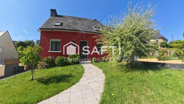 Maison familiale avec jardin paysager, 3 chambres, bureau et sous-sol complet.