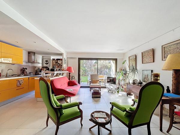 Appartement dexception avec jardin privatif