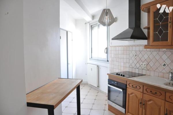 Centre ville (Halles Brauhauban)  appartement T4 avec balcon et cave. 