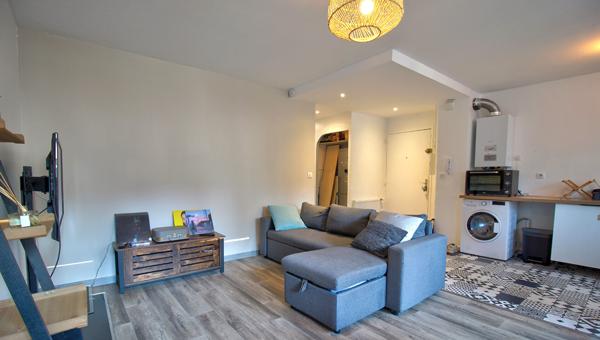 AGEN - Appartement de 57m² avec 2 chambres et place de parking privative dans un garage fermé.