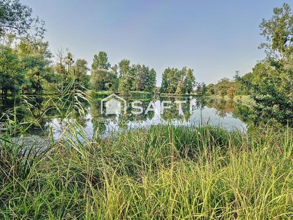 Magnifique terrain de loisirs avec un étang