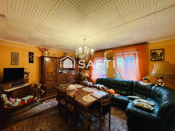 Spécial investisseur Maison mitoyenne d’un coté avec garage veranda jardin