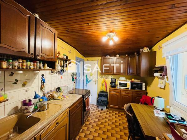 Spécial investisseur Maison mitoyenne d’un coté avec garage veranda jardin