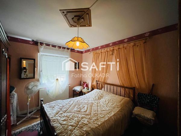 Spécial investisseur Maison mitoyenne d’un coté avec garage veranda jardin