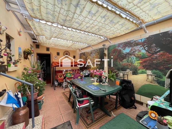 Spécial investisseur Maison mitoyenne d’un coté avec garage veranda jardin