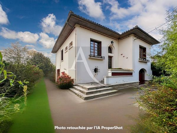 EXCLUSIVITE L'ADRESSE Charmante maison de ville avec jardin au bord du Lot