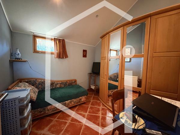 Maison 7 pièce(s) 4 chambre(s) 111 m²