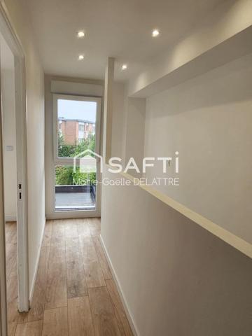Immeuble Mixte comprenant duplex de 82 m2 et local commercial indépendant de 50 M2 avec cour privative.