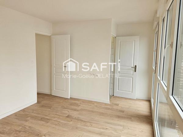 Immeuble Mixte comprenant duplex de 82 m2 et local commercial indépendant de 50 M2 avec cour privative.