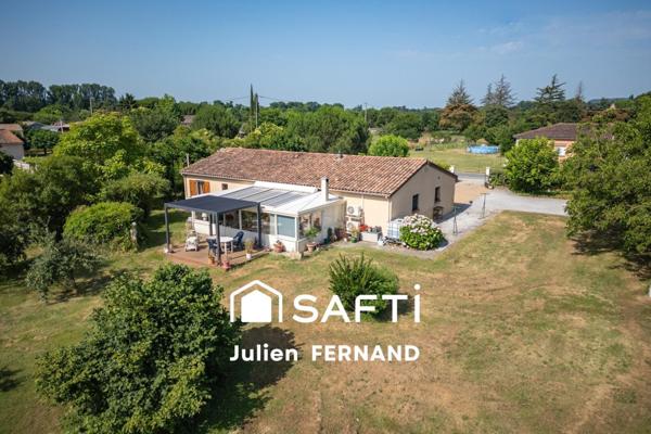 Maison plain-pied avec double garage, véranda et jardin