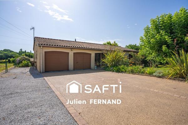 Maison plain-pied avec double garage, véranda et jardin