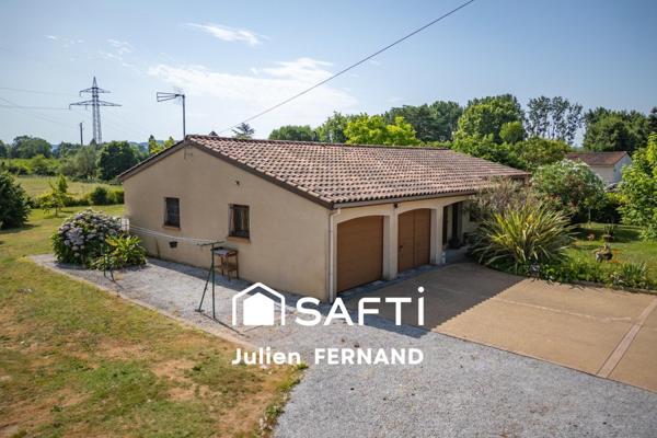 Maison plain-pied avec double garage, véranda et jardin