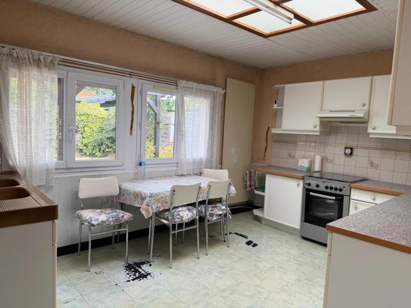 Plain pied en fond d'impasse avec jardin et garage