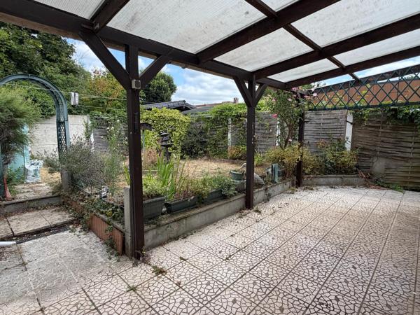 Plain pied en fond d'impasse avec jardin et garage