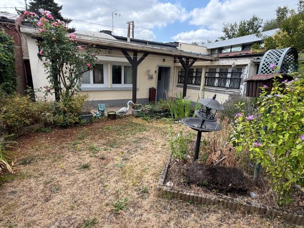 Plain pied en fond d'impasse avec jardin et garage