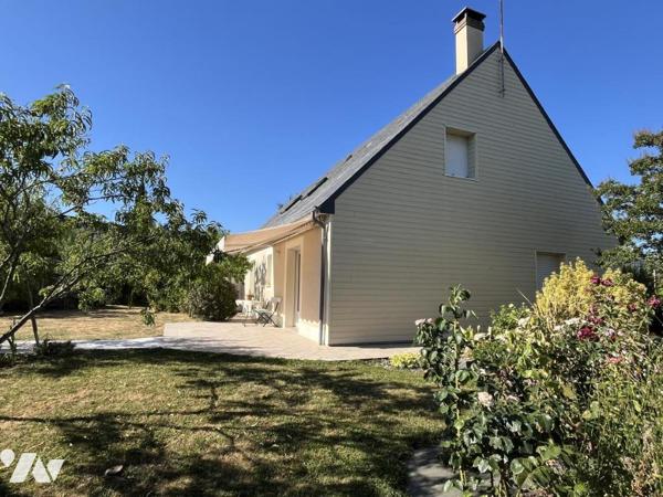 Maison de 1996 avec 4/5 chambres dont une en rdc dans un environnement calme et verdoyant