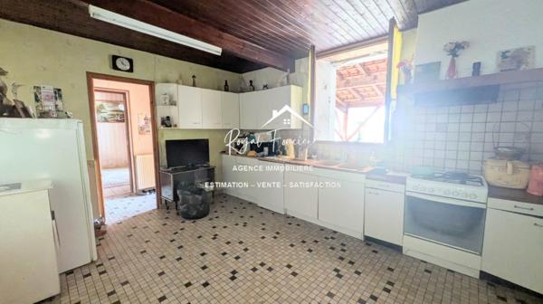 Ancien corp de ferme avec beaucoup de potentiel