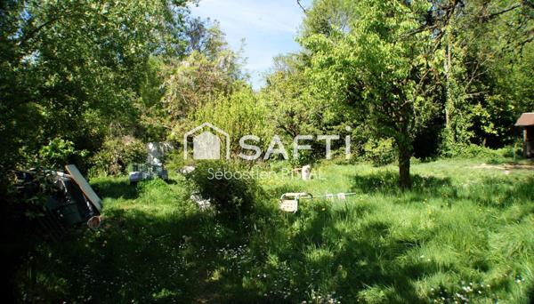 Ensemble de 2 maisons et un terrain constructible
