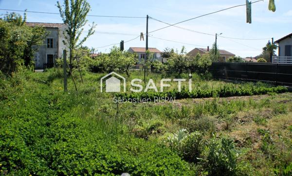 Ensemble de 2 maisons et un terrain constructible