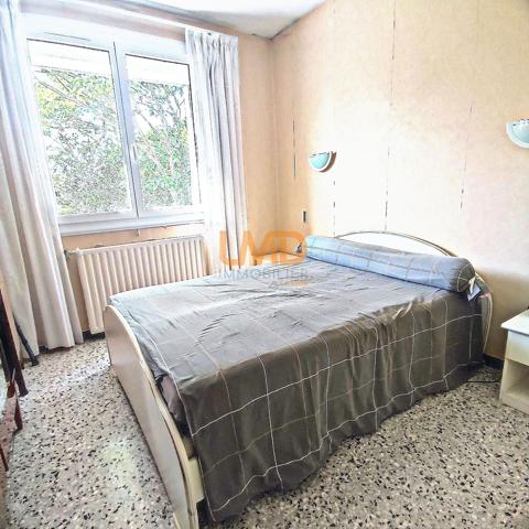 Maison sur deux niveaux quartier recherché proche d'Ales - potentiel