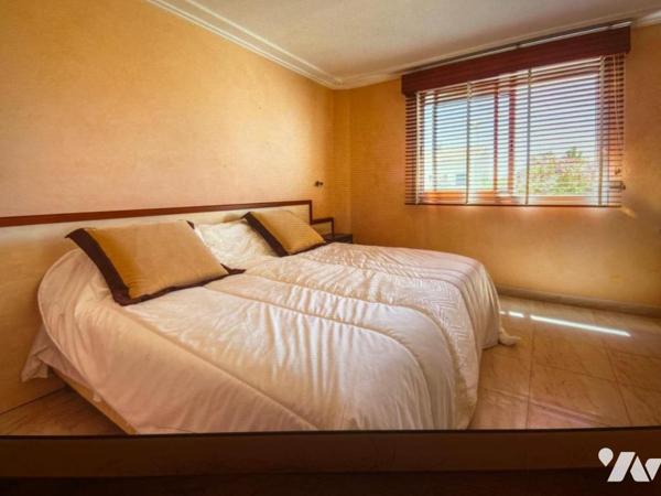 Maison d'habitation avec jardin attenant