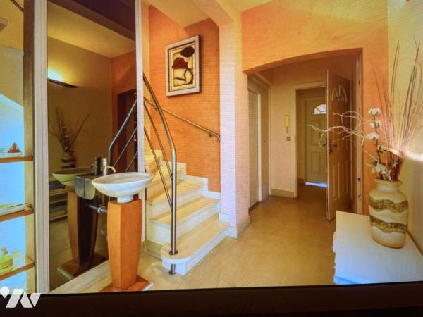 Maison d'habitation avec jardin attenant