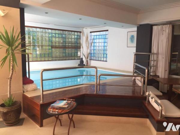 Maison d'habitation avec jardin attenant