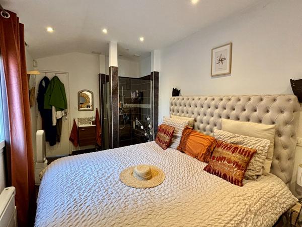 Maison de type 4 d'environ 100m² avec jardin et place de stationnement