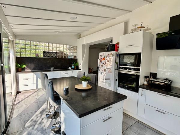 Maison de type 4 d'environ 100m² avec jardin et place de stationnement