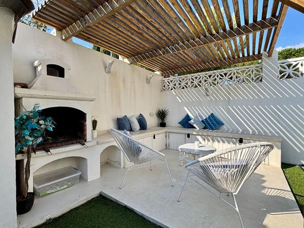 Maison de type 4 d'environ 100m² avec jardin et place de stationnement