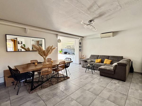 Maison de type 4 d'environ 100m² avec jardin et place de stationnement