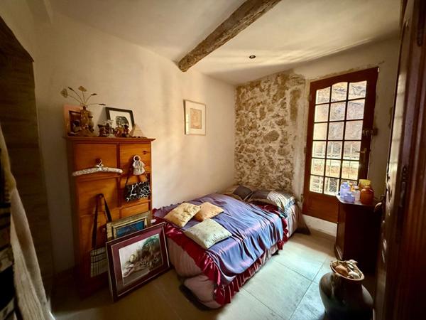 Maison avec appartement, garage et cour à Puisserguier