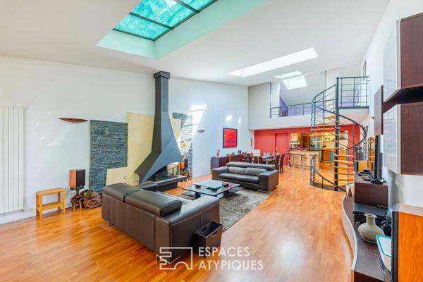 Grand loft sur trois niveaux avec espace bien-être et salle de cinéma à Argenteuil