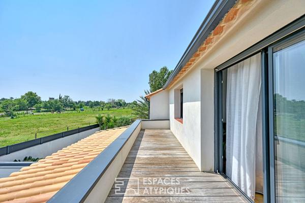 Entre ville et nature, une maison contemporaine avec vue sur les chevaux à Lattes