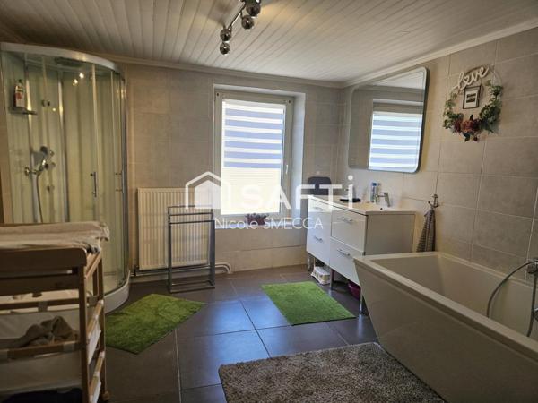 Maison mitoyenne,4 chambres,cuisine équipée,garage